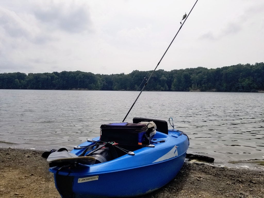 A blue colored fishing kayak
