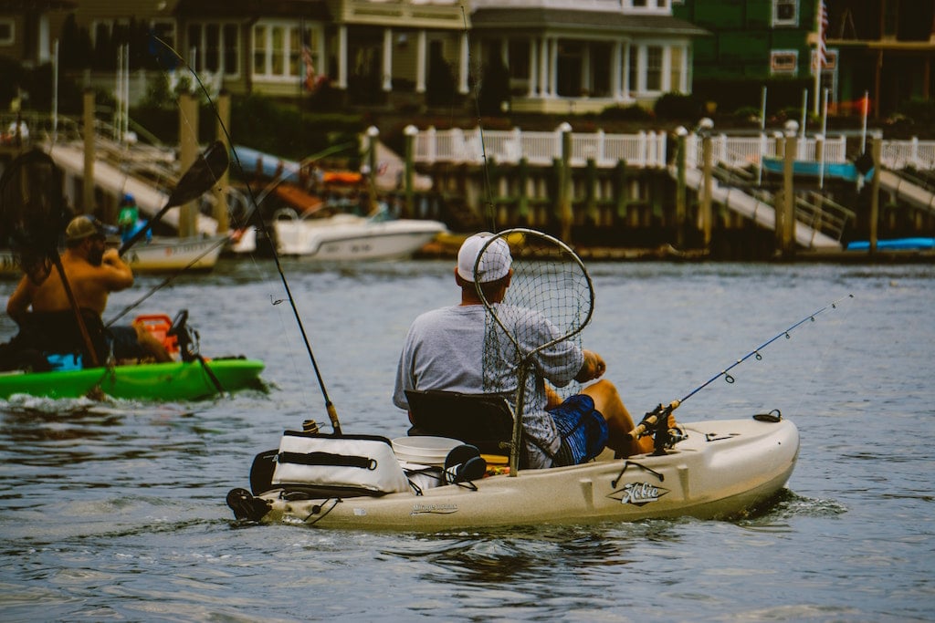 A fishermen in a Hobie fishing kayak with pedals
